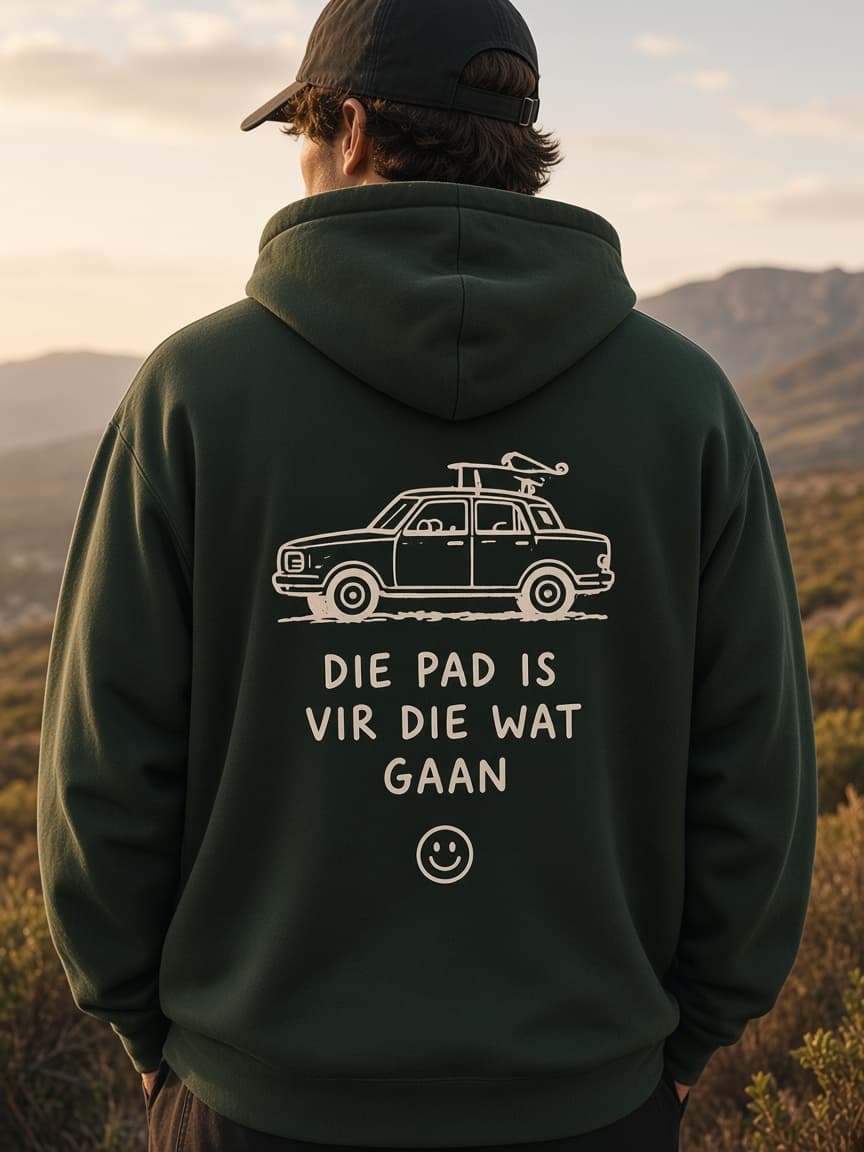 Back of the forest hoodie printed with a loaded sedan and the words Die pad is vir die wat gaan